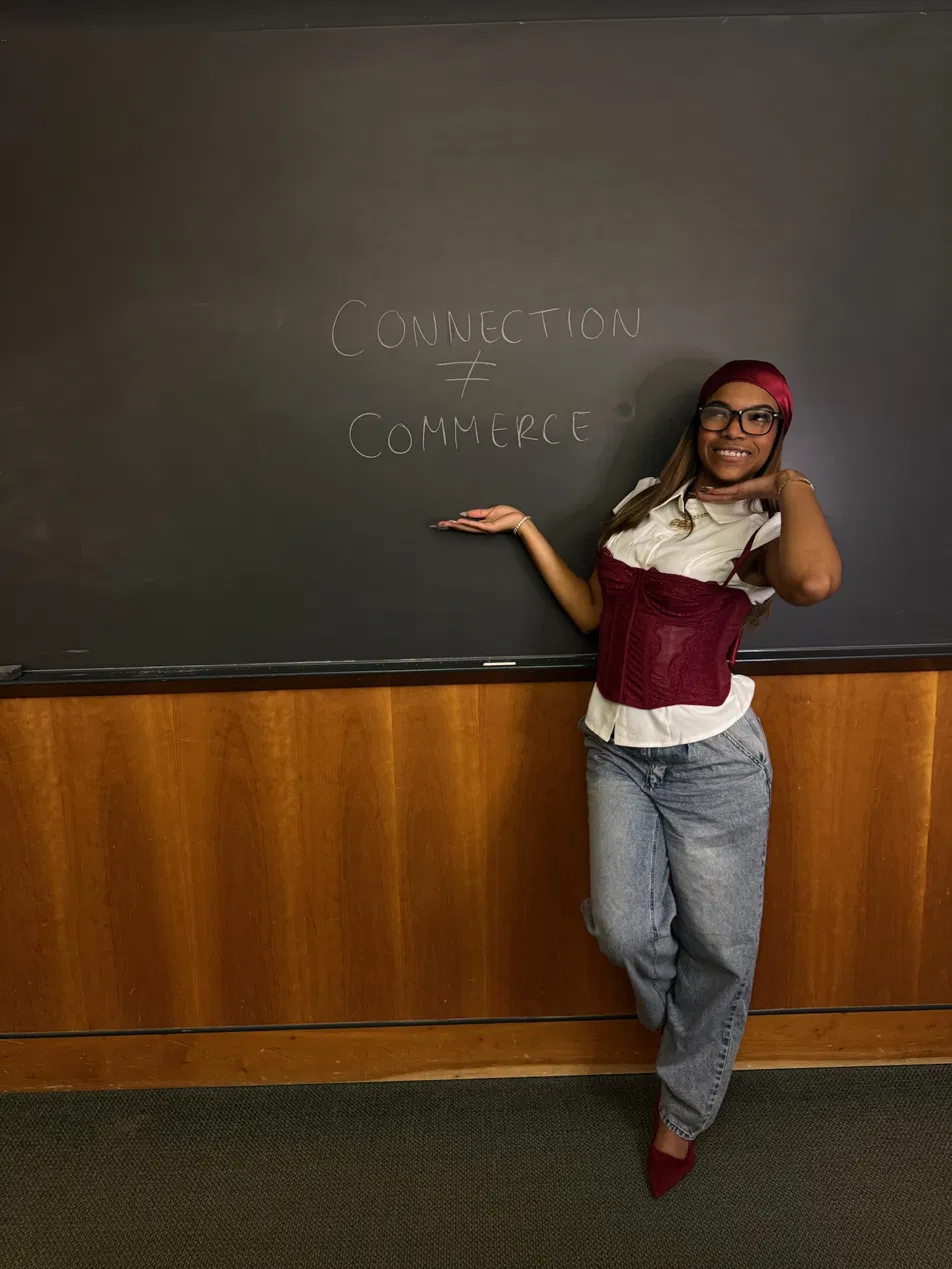 Jaychele at a chalkboard connecting audience, culture and commerce